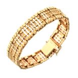 9ct gold fancy-link bracelet of pierced panel design with textured finish, 26.5g approx