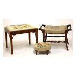 Two dressing table stools and an oval footstool, all having needlepoint upholstery