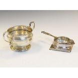George VI silver sugar bowl, Birmingham 1938, together with a George V silver tea strainer and