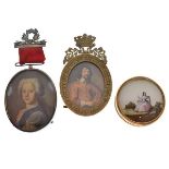 Two printed oval miniatures, one with ribbon pendant and laurel pin brooch, the other in crowned