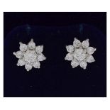 Pair of 18ct gold and diamond cluster ear studs, 2.9g gross approx