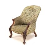 Victorian walnut framed tub shaped scroll arm chair, raised on cabriole supports