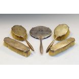 George VI silver backed dressing table set of four brushes and one mirror, Birmingham 1938