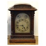 Early 20th Century German oak-cased chiming bracket clock, Kienzle, with silvered arch Arabic dial