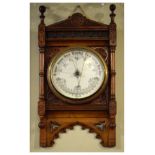 Late Victorian Aesthetic period carved oak aneroid barometer, with architectural case, 58cm high