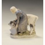 Royal Copenhagen porcelain figure of a milkmaid with calf, the base with printed mark, 16cm high