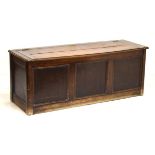 Early 20th Century oak log box having hinged cover opening to reveal two rectangular metal log bins,