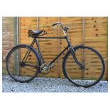 Vintage Elswick bicycle having leather saddle and rod front brake