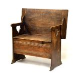 Early 20th Century oak monks bench/table, the box seat having hinged cover, 91.5cm wide