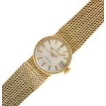 Omega - Lady's 9ct gold 'Ladymatic' wristwatch, silvered dial with baton hours and markers, centre
