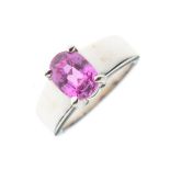 White metal and pink sapphire ring, set single faceted oval stone, stamped 750, size J, 6.6g gross