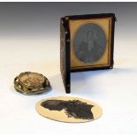 Victorian oval photographic portrait of a lady wearing a bonnet, in embossed hide case, together