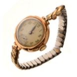 Early 20th Century lady's 9ct gold wristwatch, cream Arabic dial, manual wind movement, flexible