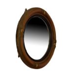 Regency style circular convex wall mirror having gilt and ebonised frame, 61cm diameter overall