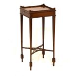 Edwardian mahogany and string inlaid urn stand fitted a slide, raised on slender tapered supports