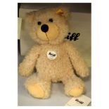 Boxed 'Charly' Steiff teddy bear, serial no. 012808, within the original box, measures approximately