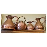 Three assorted late 19th/early 20th Century copper harvest measures, largest Two Gallon, together