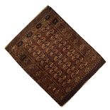 Small early 20th Century Tekke or Belouch rug, the brick-red field with three rows of ten guls