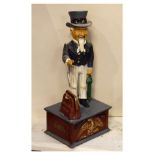 Reproduction cold-painted cast metal novelty money bank with articulated figure of 'Uncle Sam', 28cm