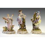 Pair of Dresden porcelain figures, man with a carrier pigeon, lady with a flower garland having
