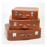 Graduated set of three 'Pukka' Luggage crocodile-effect suitcases, largest 60cm wide (3)