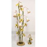 Floor standing painted metal standard lamp with flowering plant decoration and bell-shaped shades,