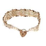 9ct gold gate-link bracelet with heart-shaped padlock, 12.4g approx