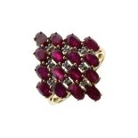 9ct gold, diamond and red garnet-set dress ring set sixteen faceted oval garnets with nine smaller
