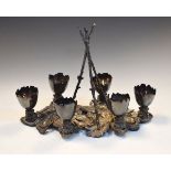 Victorian silver-plated six egg cruet of naturalistic form with 'broken eggshell' cups on