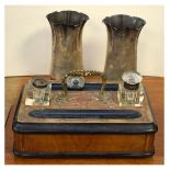 Late Victorian walnut and ebonised deskstand fitted glass inkwells beside pen trays over base