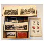 Assorted topographical postcards, souvenir cards and stereoscopic cards to include; albums of