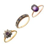 Three assorted gold and yellow metal rings comprising: 18ct gold, amethyst and diamond flowerhead