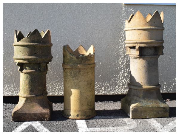 Three various crown chimney pots, the tallest 90cm high