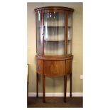 Edwardian mahogany and satinwood crossbanded bowfront display cabinet fitted two shelves with