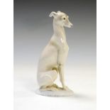 Rosenthal porcelain figure of a seated whippet with green back stamp, 15cm high
