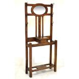 Early 20th Century oak hallstand with oval mirror panel, 78cm wide