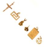 Assorted gold and yellow metal charms plus an earring, 10.6g gross approx (6)