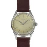 Longines - Gentleman's vintage stainless steel-cased wristwatch, champagne dial with baton hours,
