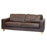 Contemporary brown leather settee, raised on beech supports approximately 204cm wide