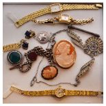 Assorted costume and dress jewellery to include; three gold-plated watches, two cameo brooches,