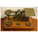 Early 20th Century set of mahogany and brass Inland Letter Post scales with weights, together with a