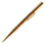 Sampson Mordan & Co - 9ct gold retractable pencil with textured cylindrical barrel, London 1928