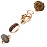 Seven assorted 9ct gold and yellow metal rings to include; lava stone cameo ring, Wedgwood-style