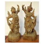 Pair of early to mid 20th Century South East Asian carved wooden figures of dancers, possibly