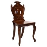 19th Century mahogany hard seat hall chair having carved back and cabriole supports