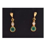 Pair of 9ct gold, emerald and diamond earrings of graduated design, 2.1g gross approx