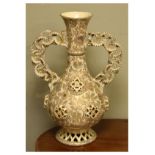 Fischer, Budapest Hungarian pottery vase having applied reticulated roundels and pair of conjoined