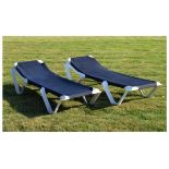 Pair of adjustable sun loungers