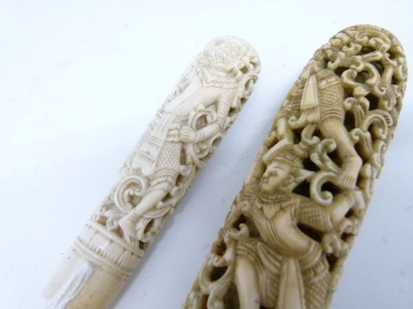 Two 19th Century Indian carved ivory handles, the longer possibly from a sword or staff, the shorter - Image 2 of 7