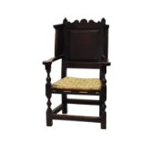 Interesting 18th Century North Country joined oak wing-back arm chair, of 'Lambing' type, the